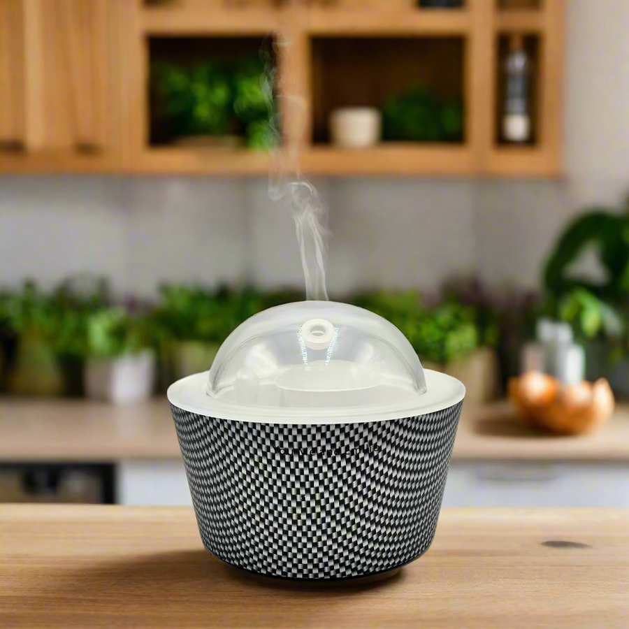 Black and white patterned container with a clear dome lid on a white background