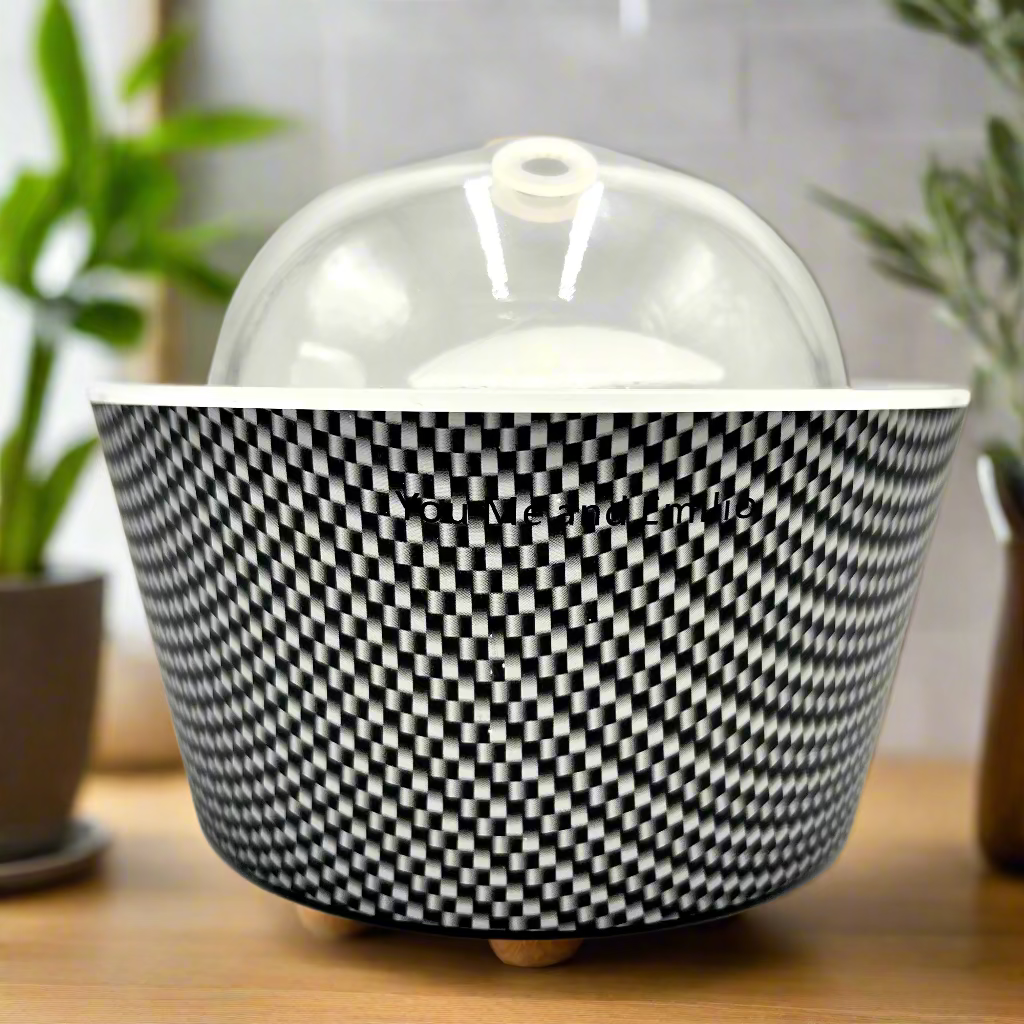 Black and white checkered container with a clear dome lid on a white background