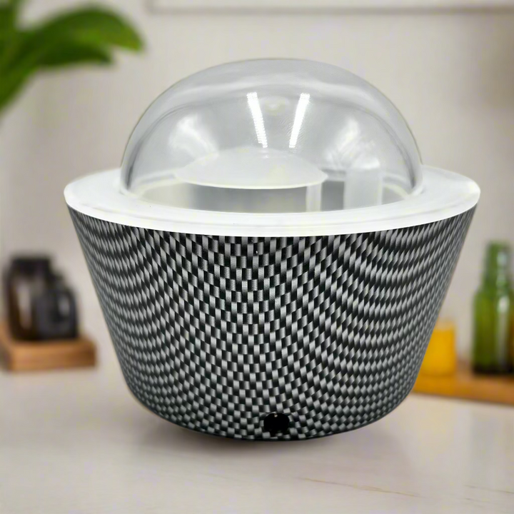 Black and white patterned basket with a transparent lid on a light gray background