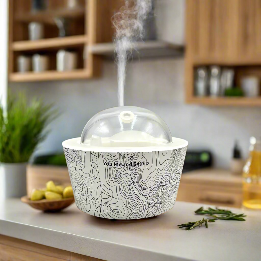 Cup with lid featuring topographic design on a white background