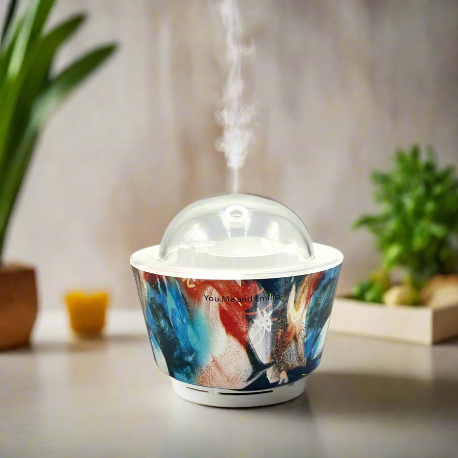 Colorful cylindrical container with a transparent lid on a white background