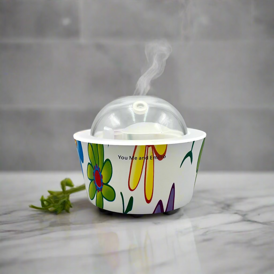 Colorful flower-patterned container with a clear dome lid on a white background