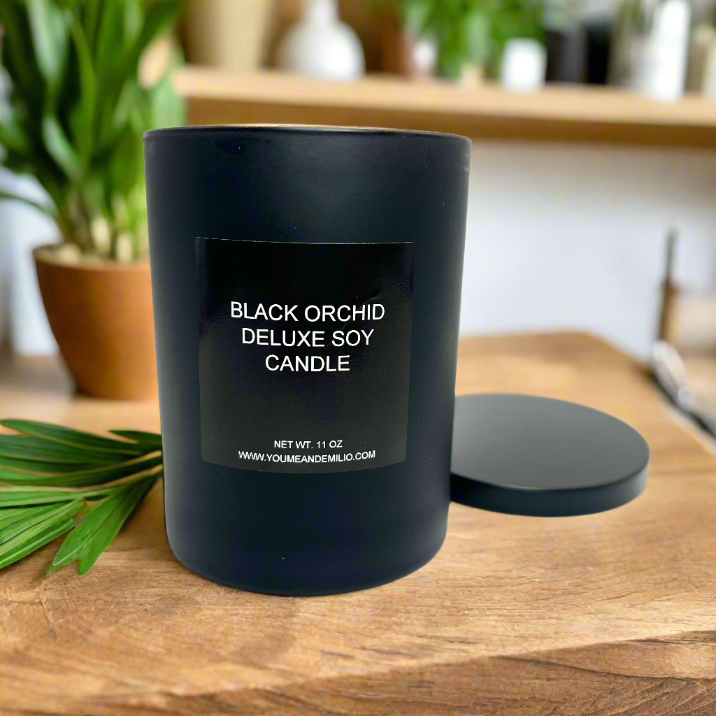 A warm glow from the Tom Ford Inspired Black Orchid Candle, enhancing an elegant ambiance with its rich fragrance.