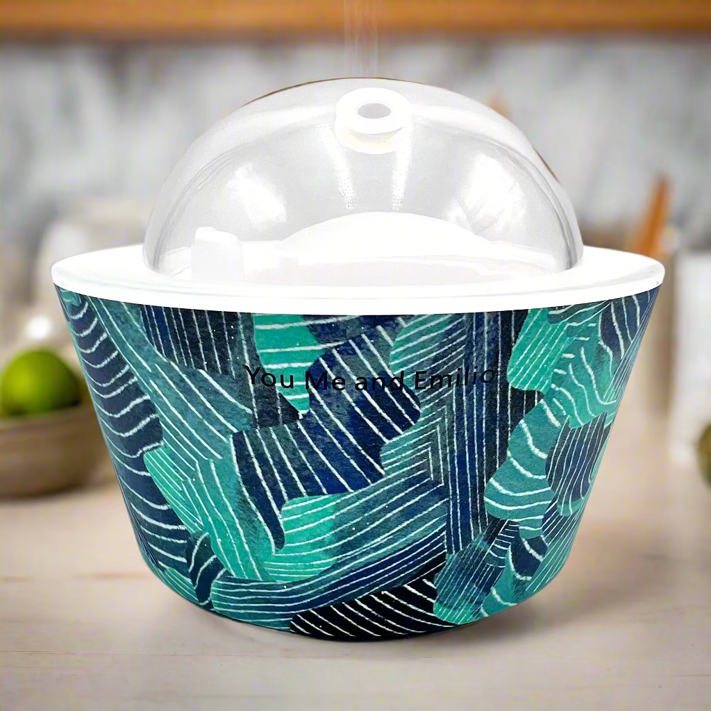 Container with blue and green leaf pattern on a white background