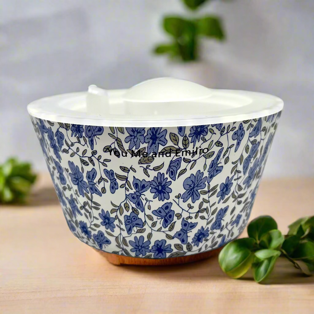 Ceramic bowl with blue floral pattern on a white background