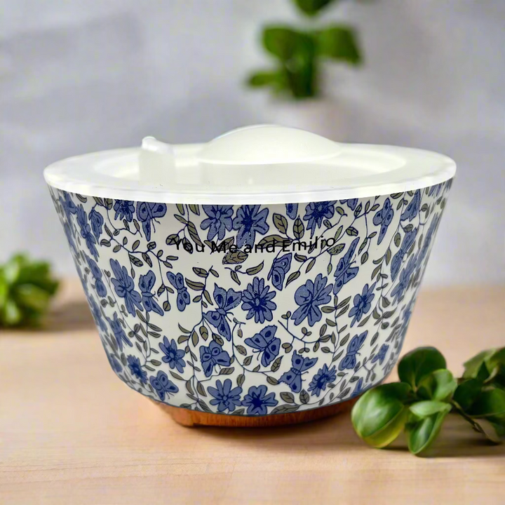 Ceramic bowl with blue floral pattern on a white background