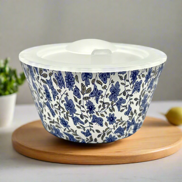 Ceramic baking dish with blue floral pattern on a white background