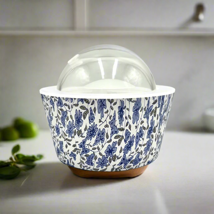 White container with blue floral pattern on a white background
