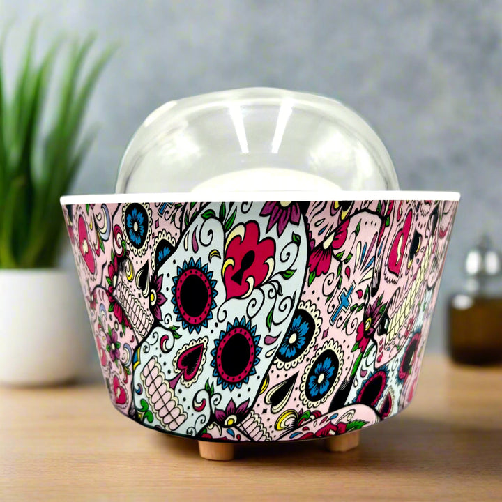 Bring calm and elegance to your space with our Day Of The Dead Catrina Oil Diffuser. Ultrasonic mist, 10-hour runtime & auto shut-off. Shop YOU ME & EMILIO.