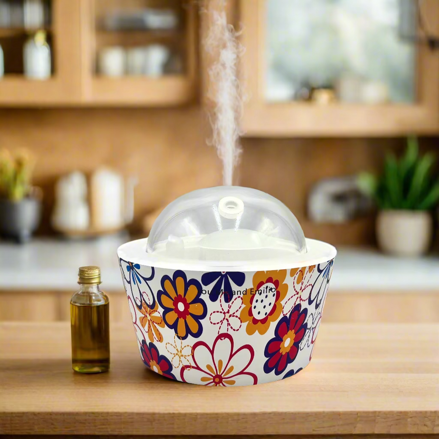 Colorful floral-patterned container with a clear dome lid on a white background