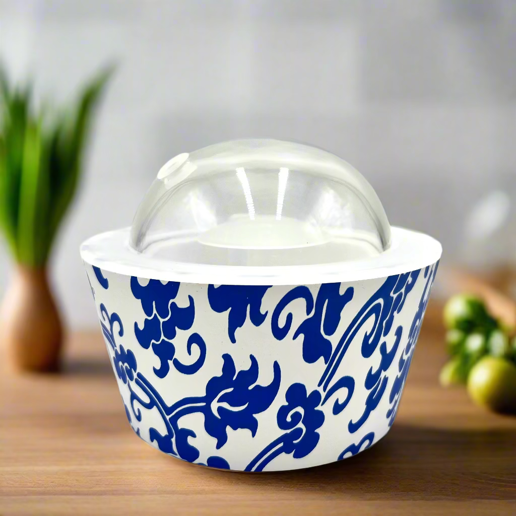 Ceramic container with blue floral pattern on a white background