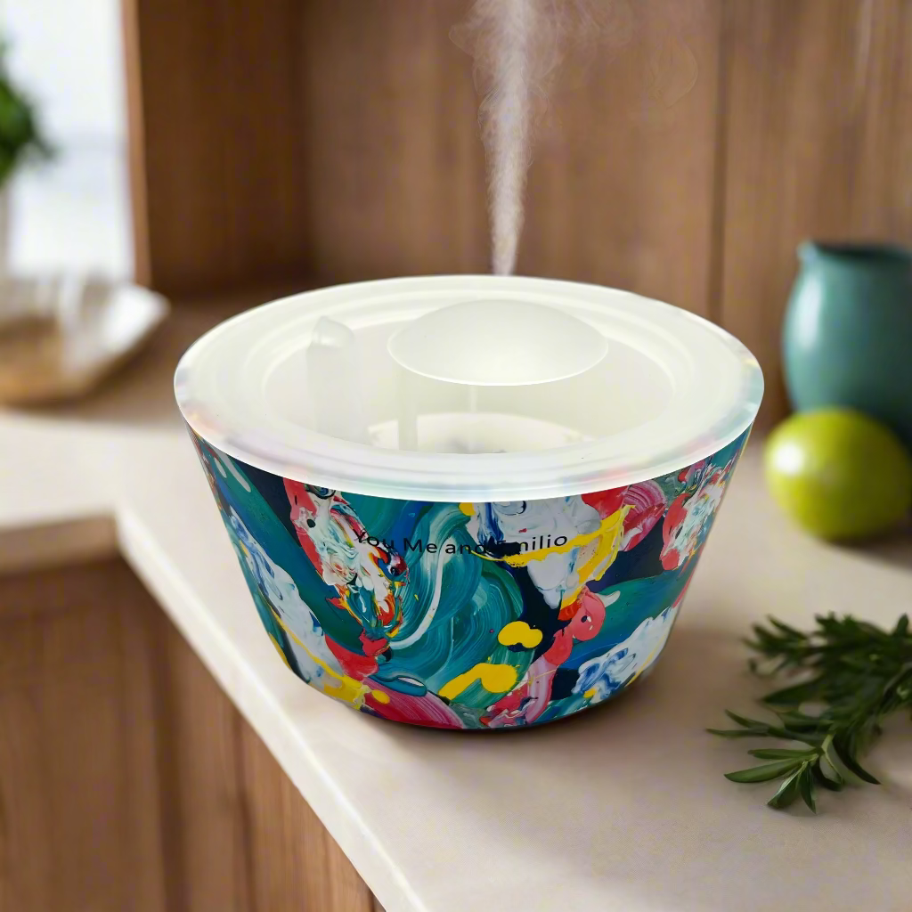Colorful container with a white lid on a white background