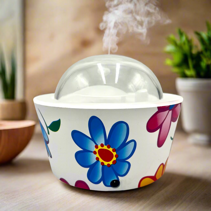 Colorful floral-patterned bowl with a transparent lid on a white background