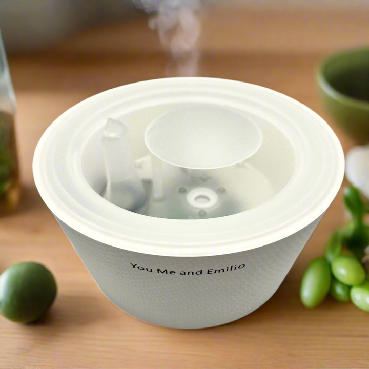 White pet bowl with a lid on a white background