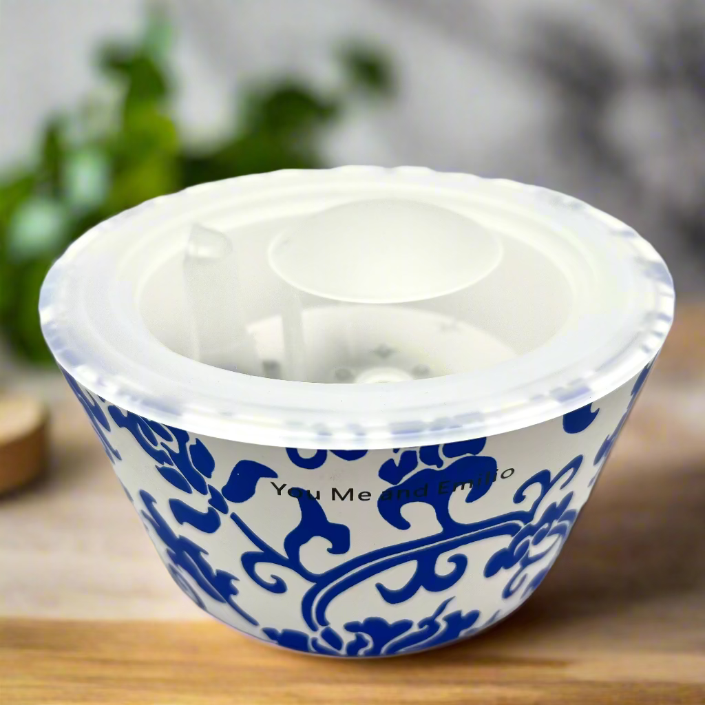 White container with blue floral pattern on a white background