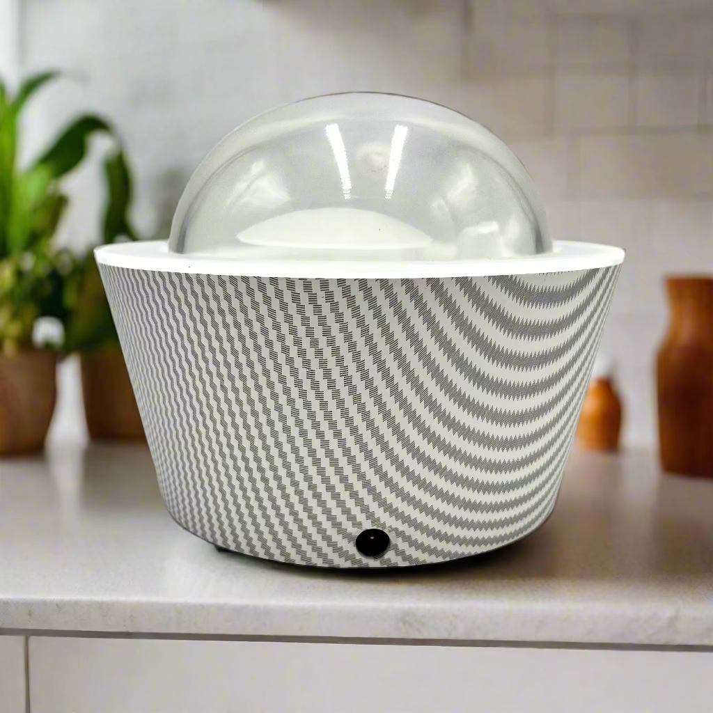 White container with gray patterned lid on a white background
