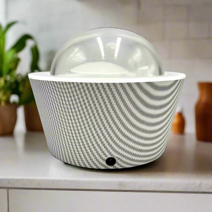 White container with gray patterned lid on a white background