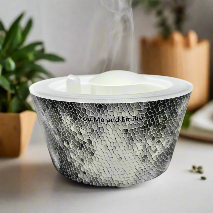 White container with textured black base on a light gray background