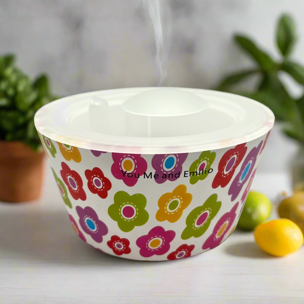 Colorful floral-patterned bowl on a white background