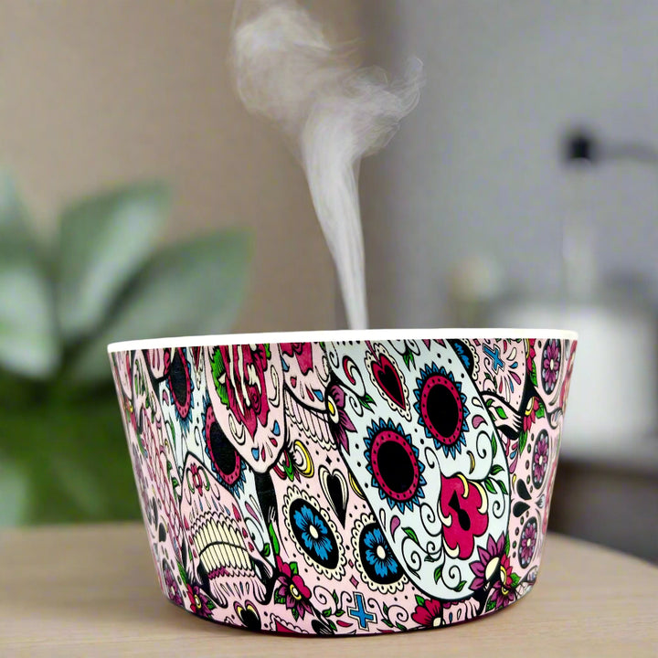Bring calm and elegance to your space with our Day Of The Dead Catrina Oil Diffuser. Ultrasonic mist, 10-hour runtime & auto shut-off. Shop YOU ME & EMILIO.