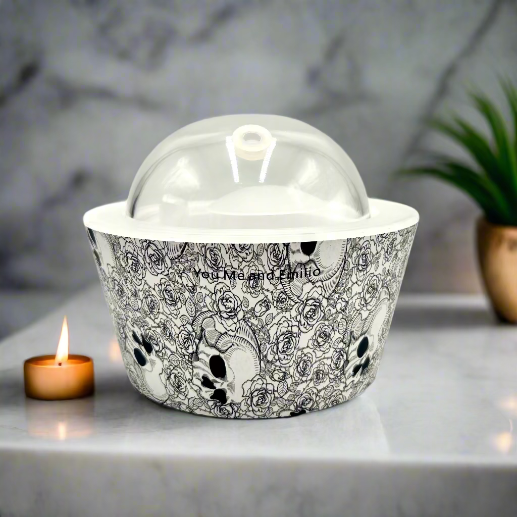 Decorative container with black and white floral pattern on a white background