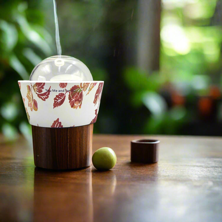 Elegant Blooming Essence Oil Diffuser featuring sculptural floral design and soft misting by YOU ME & EMILIO.