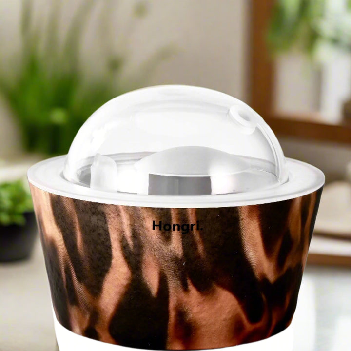 Flame Essential & Fragrance Oil Diffuser releasing a soft mist, creating a calming and serene atmosphere.
