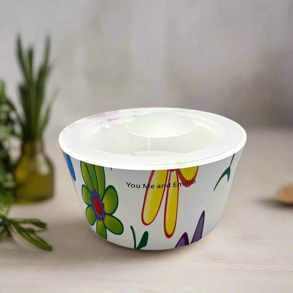 plastic colorful bowl with colorful floral design on a white background