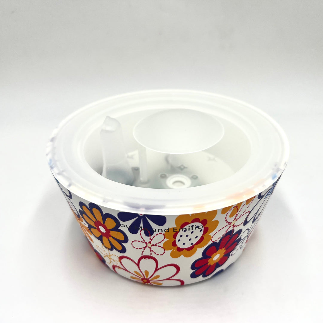 Plastic bowl with floral patterns on a white background