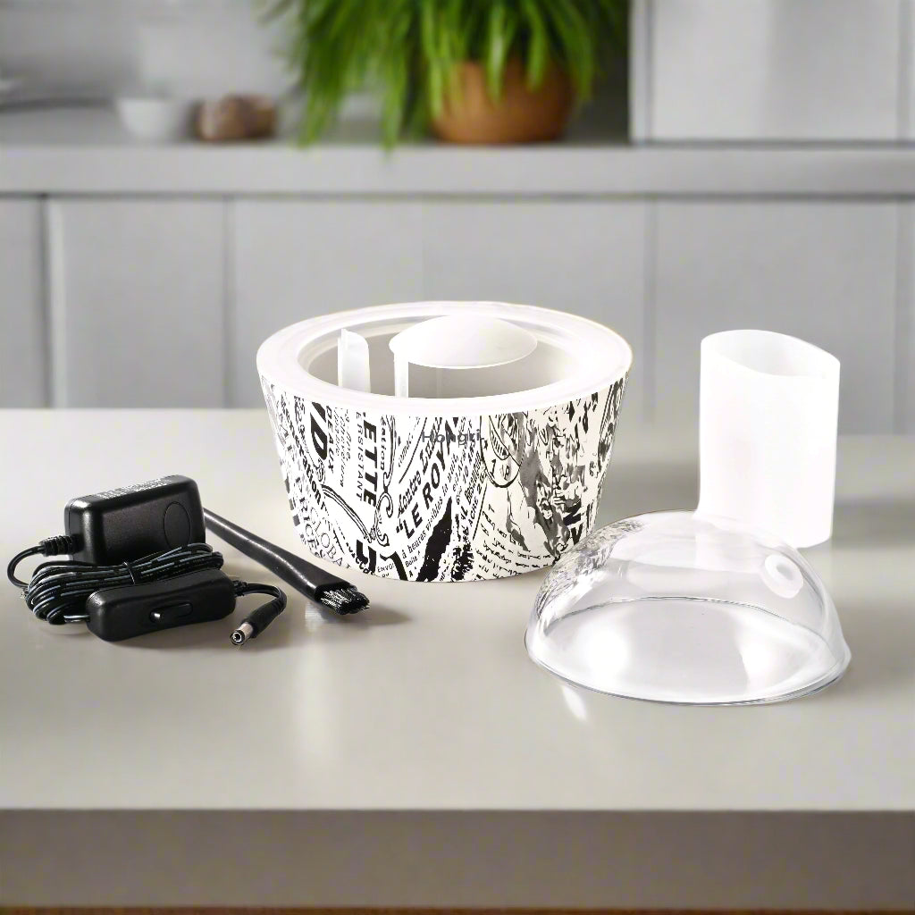 Le Royal Essential & Fragrance Oil Diffuser in a calming, minimalist living room, infusing the air with soothing aromas.