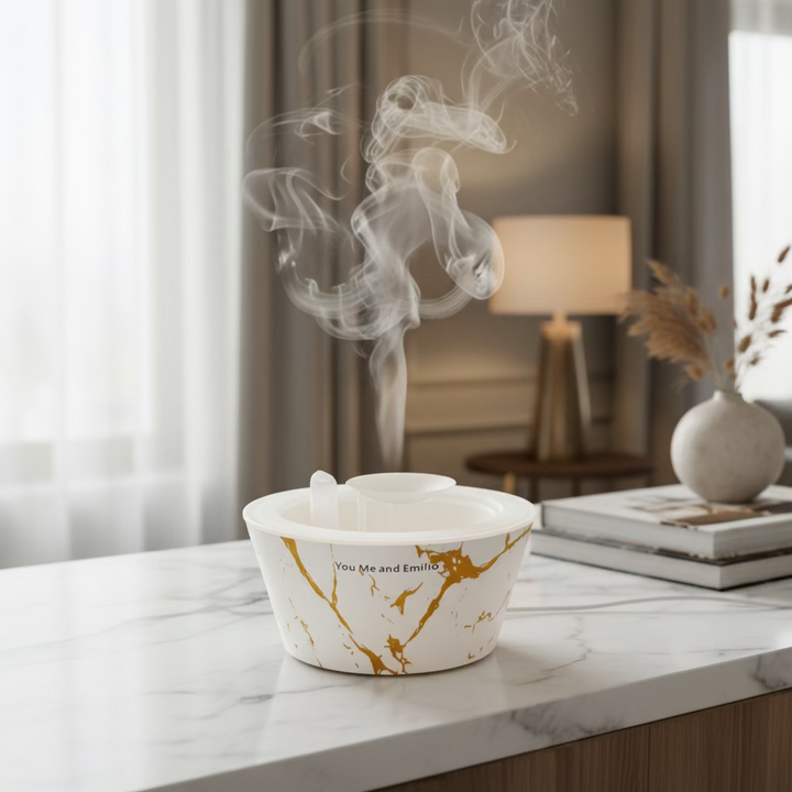 White container with gold marbling and text on a white background