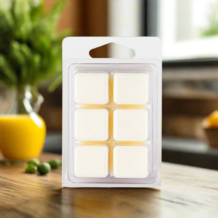 Pack of wax melts in a clear plastic packaging on a white background
