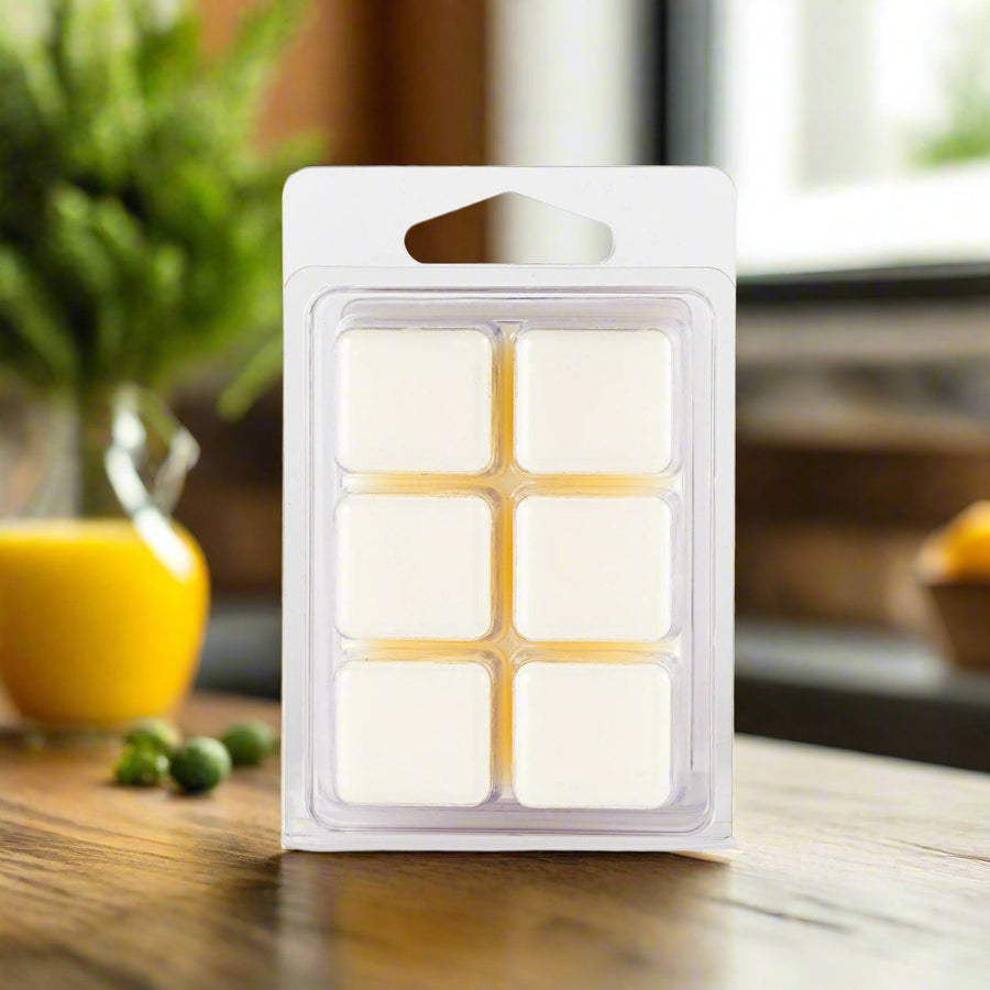 Pack of wax melts in a clear plastic packaging on a white background