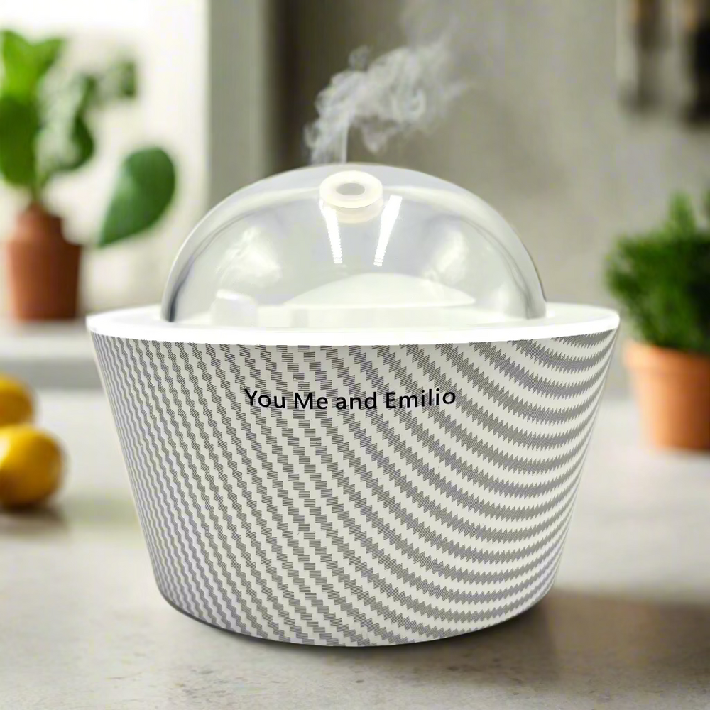 Ceramic bowl with a lid featuring a gray and white pattern on a light gray background.