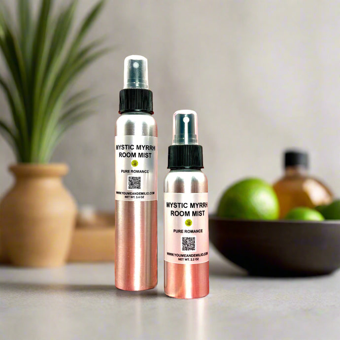 A stylish frosted glass bottle of Mystic Myrrh Room Mist with a sleek black spray nozzle, offering an instant burst of earthy, mystical fragrance for any room.