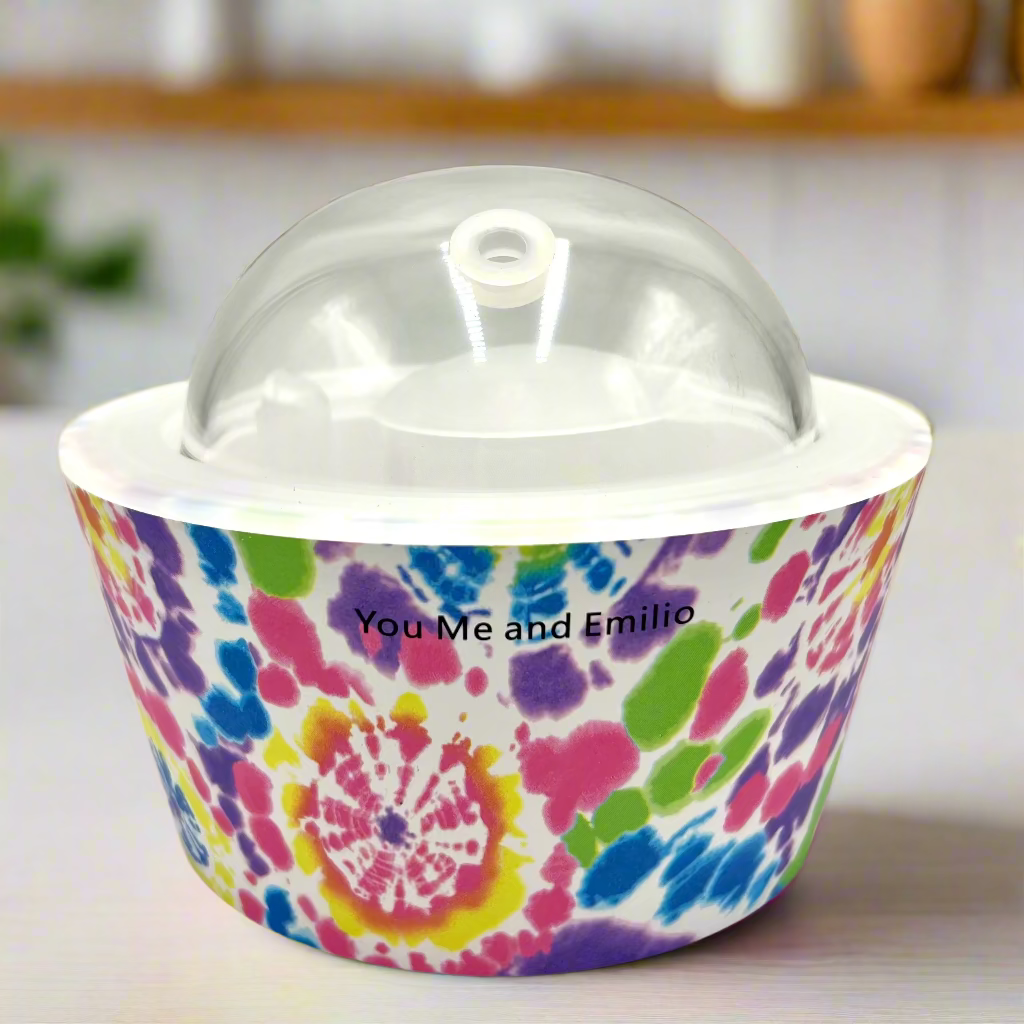 Colorful tie-dye container with a clear lid on a white background