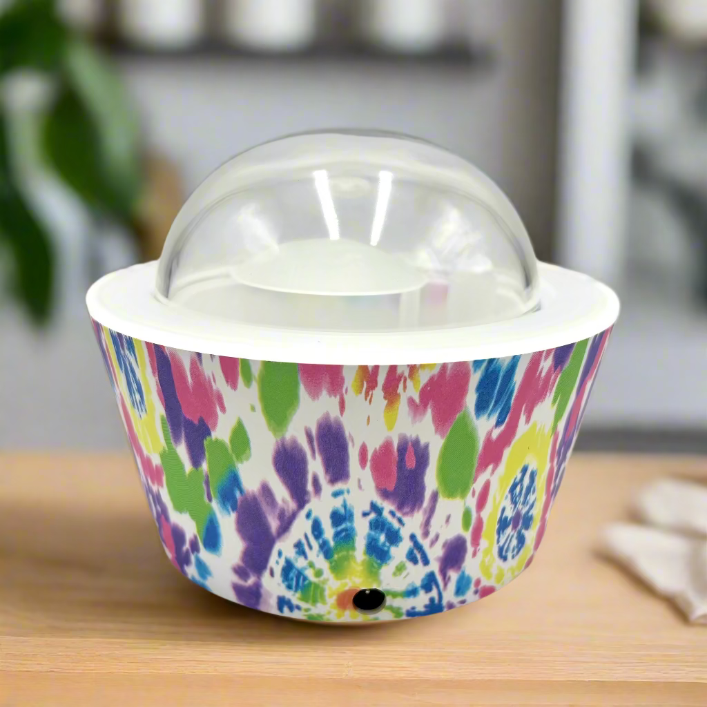 Colorful tie-dye ice cream container with a clear lid on a white background