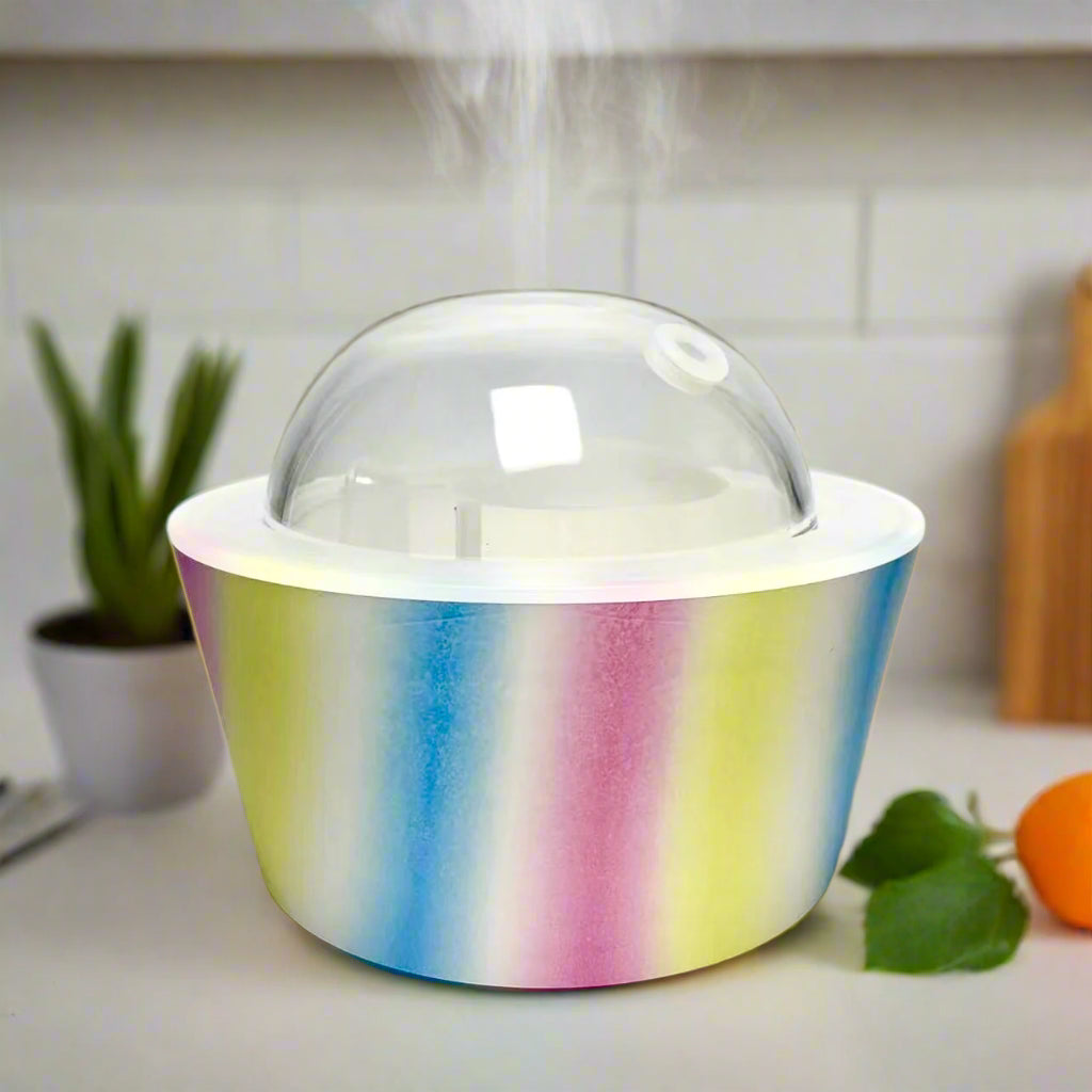 Rainbow Mist Oil Diffuser by YOU ME & EMILIO, featuring vibrant pride colors and calming mist for joyful, inclusive spaces.