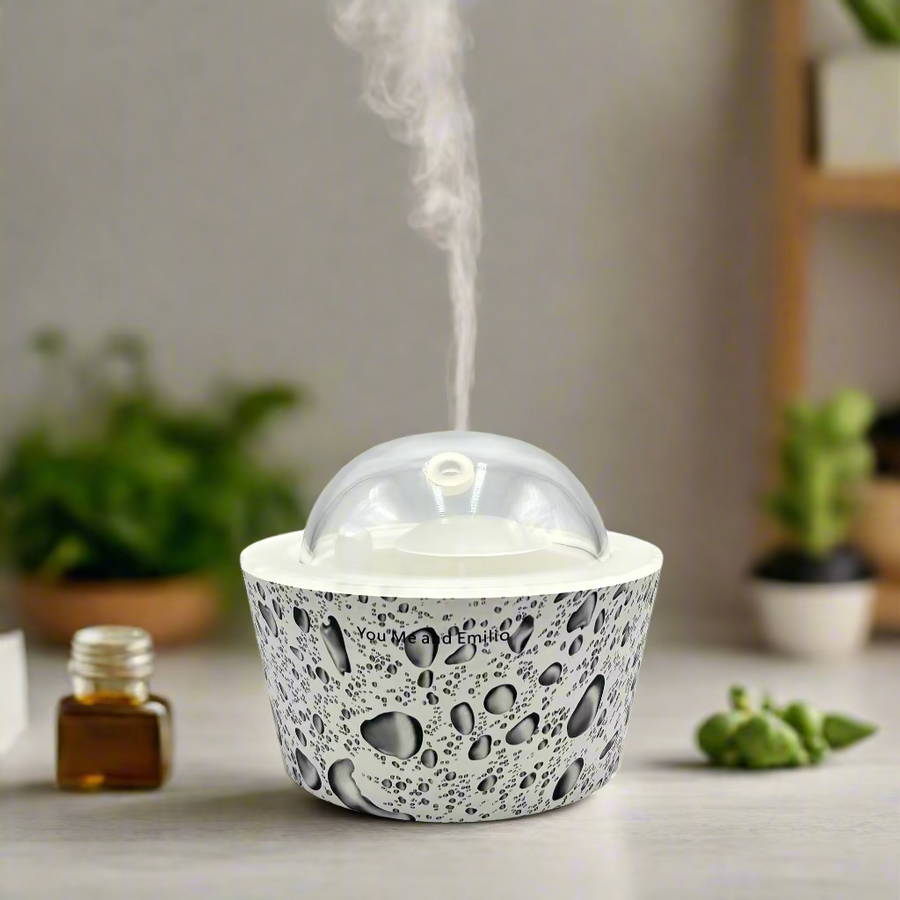 plastic diffuser with a transparent cover on a white background
