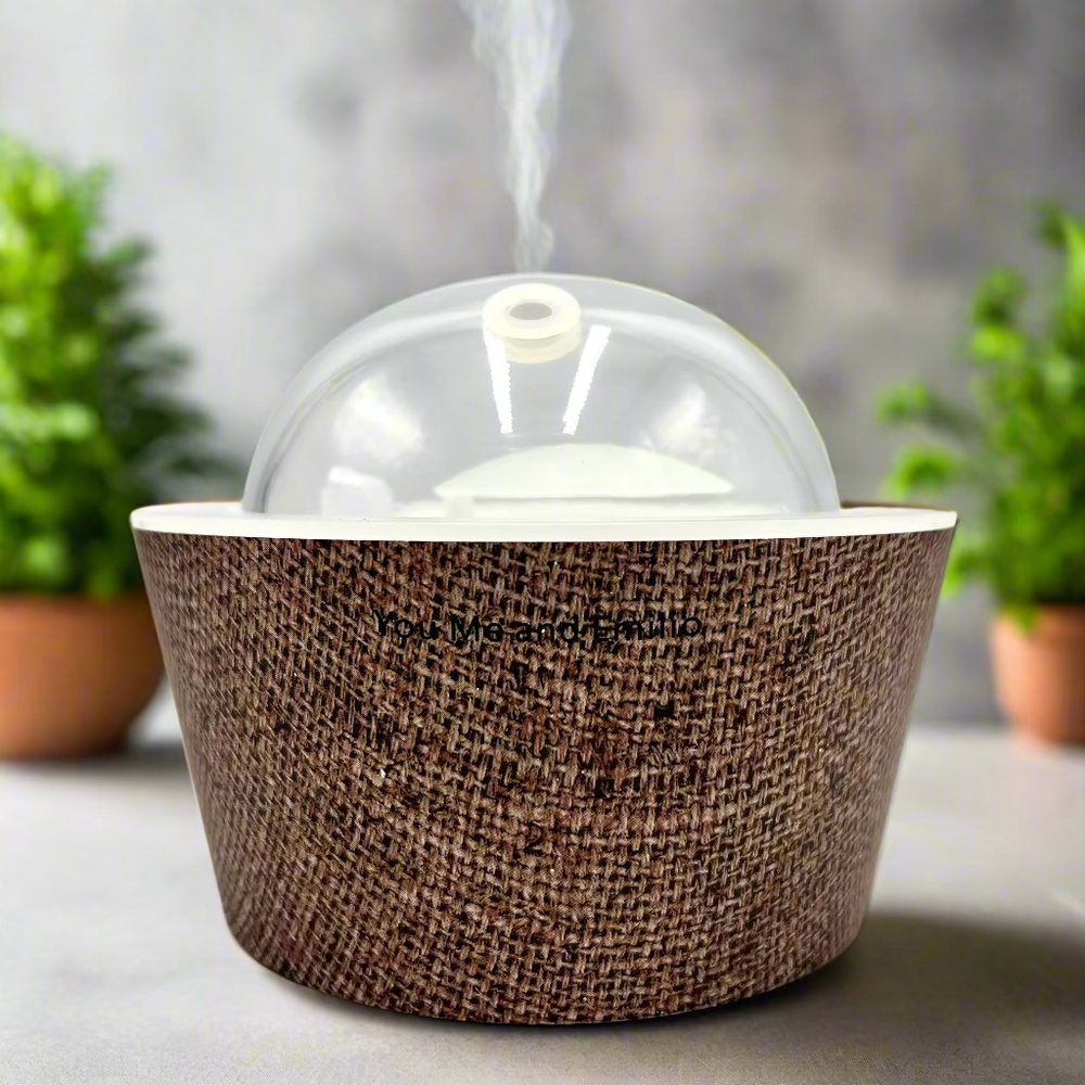 Brown textured fabric container with a clear dome lid on a white background