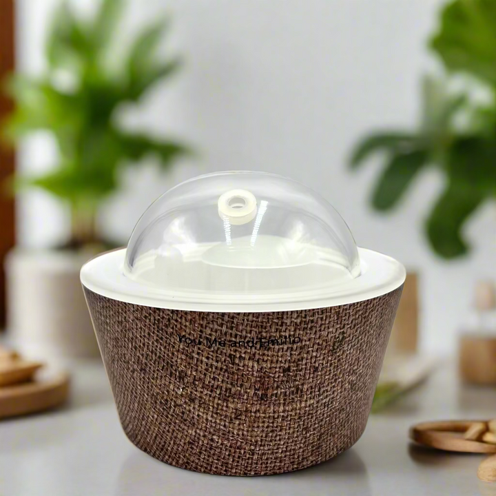 Brown textured container with a clear dome lid on a white background