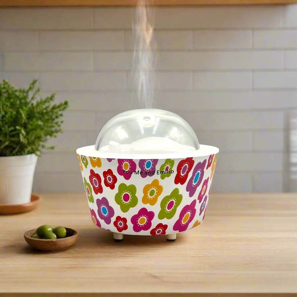 Colorful floral-patterned container with a clear dome lid on a white background