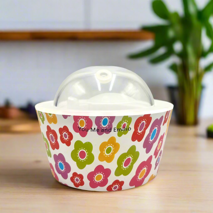 Decorative bowl with colorful floral pattern on a white background