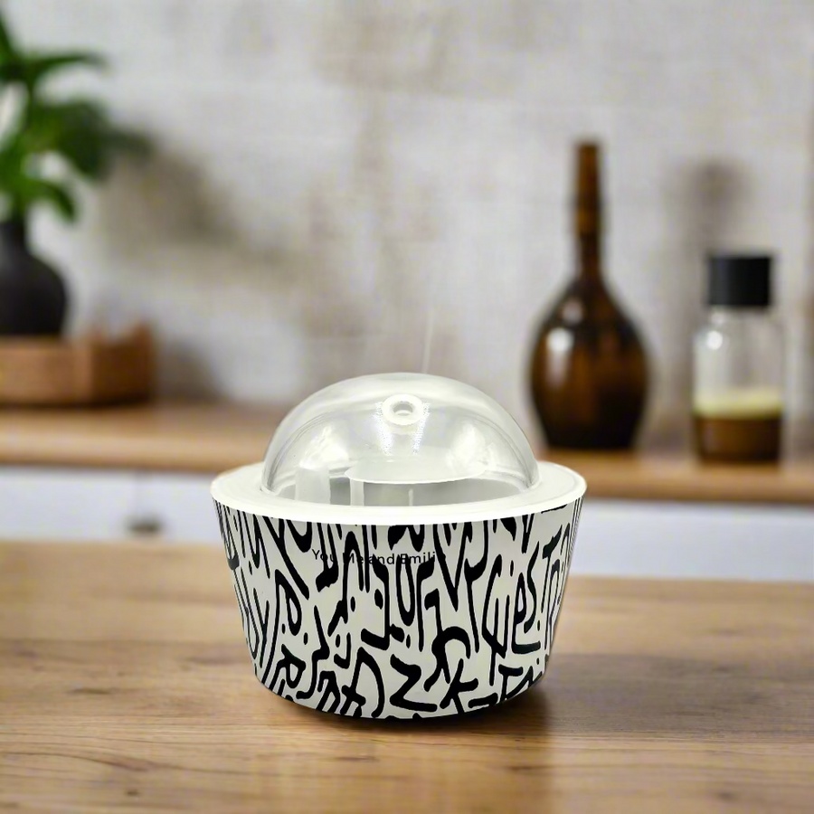 Black and white patterned container with a clear dome lid on a white background