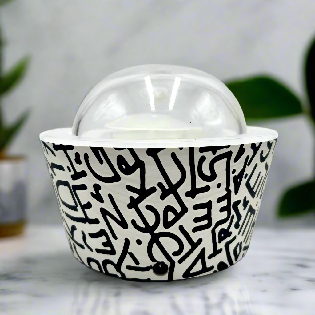 Plastic bowl with black abstract pattern on a white background