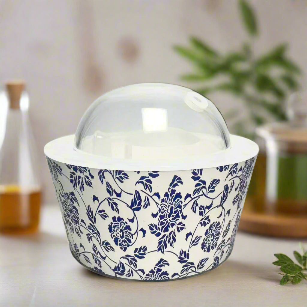 Elegant floral oil diffuser creating relaxing mist and aromatherapy atmosphere