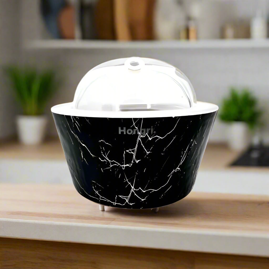 Elegant black oil diffuser named Stormy Night, styled on a wooden shelf with ambient lighting.