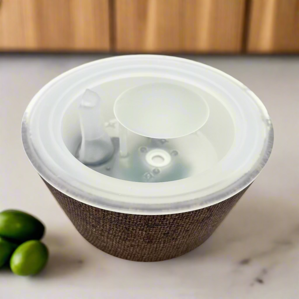 Wicker basket with a clear plastic lid on a white background