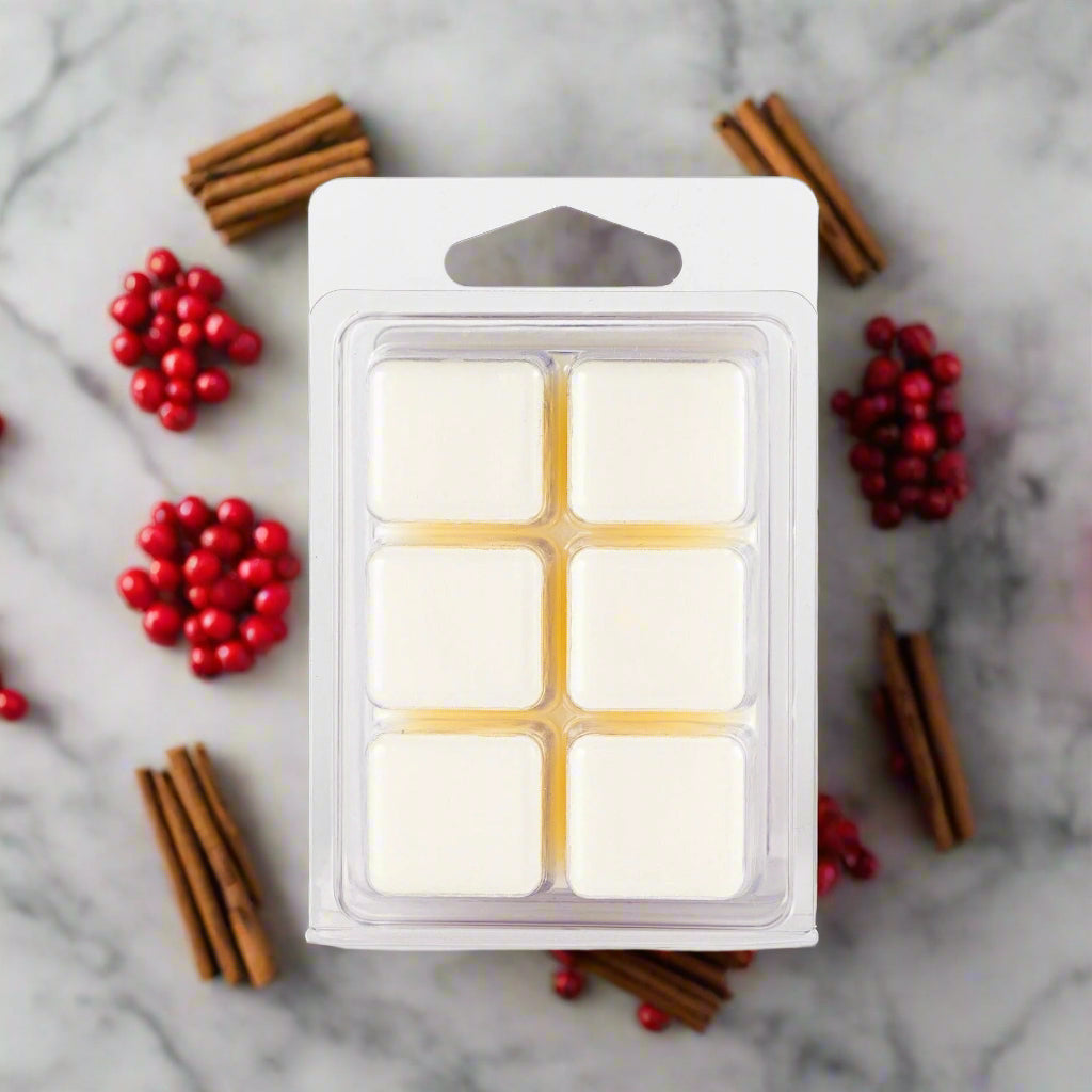 Immerse yourself in the intoxicating essence of our holiday fragrance. The perfect blend of sweetness, spice, and warmth creates a captivating aroma that will fill your space with a sense of joy and wonder. The scent is enhanced with a hint of frosted cranberry, adding a touch of freshness and whimsy to the fragrance. Get ready to be enchanted by the delightful scent of our Wonderland Soy Wax Melts.