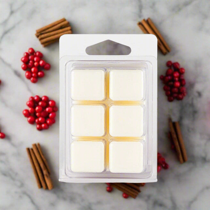 Immerse yourself in the intoxicating essence of our holiday fragrance. The perfect blend of sweetness, spice, and warmth creates a captivating aroma that will fill your space with a sense of joy and wonder. The scent is enhanced with a hint of frosted cranberry, adding a touch of freshness and whimsy to the fragrance. Get ready to be enchanted by the delightful scent of our Wonderland Soy Wax Melts.